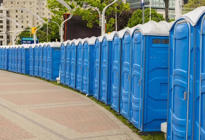 portable restrooms lined up at a marathon, ensuring runners can take a much-needed bathroom break in Candor